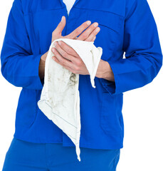 Cropped image of mechanic wiping hand with napkin