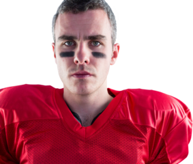 Portrait of a serious american football player looking at camera