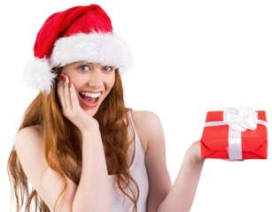 Festive redhead holding a gift