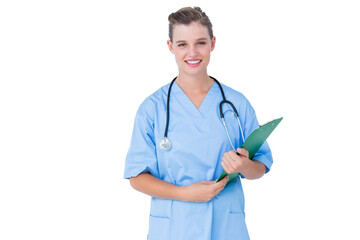 Smiling nurse holding clipboard 