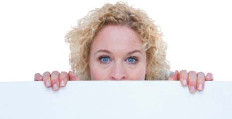Happy woman holding blank sign