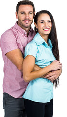 Smiling couple hugging and looking at the camera