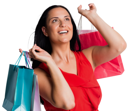 Woman standing with shopping bags
