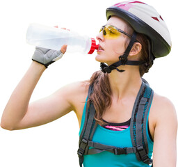 Fototapeta premium Young mountain biker drinking water 