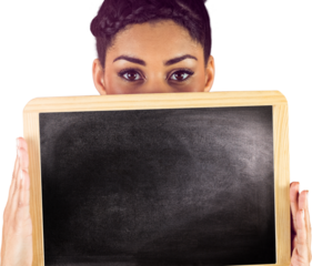 Portrait of woman holding chalkboard