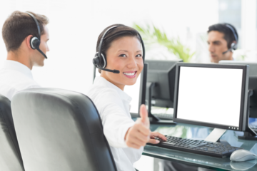 Portrait of a businesswoman showing thumbs up