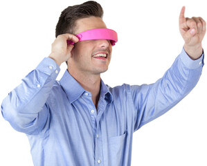 Happy young man gesturing while using virtual reality headset