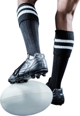 Sportsman keeping leg on ball while playing rugby