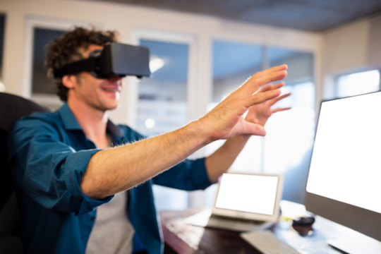 Businessman wearing virtual glasses