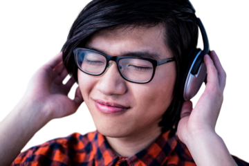 Smiling hipster listening music with headphone