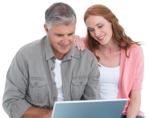 Casual couple looking at laptop