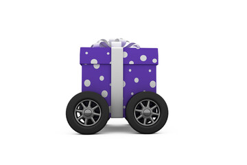 Polka dot gift box with gray ribbon on wheels 