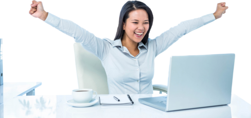 Happy businesswoman with raised arms