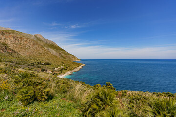 View of the beautiful blue sea falling between the mountain shores.