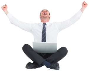 Businessman using laptop and cheering