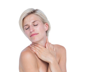 Peaceful woman touching her neck 