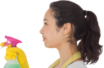 Woman spraying cleaning product