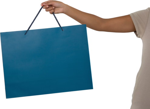 Cropped image of woman holding blue shopping bag - Powered by Adobe