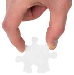 Foto op Plexiglas Hand holding jigsaw piece © vectorfusionart
