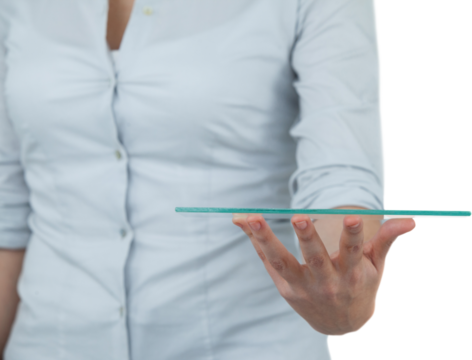 Midsection of businesswoman pretending to hold digital tablet