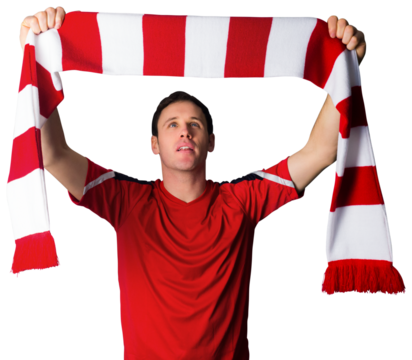 Football fan in red holding scarf