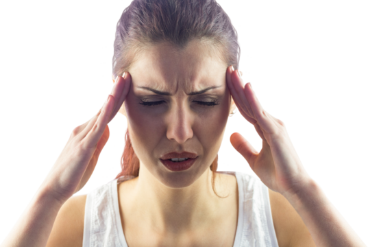 Woman holding head in pain