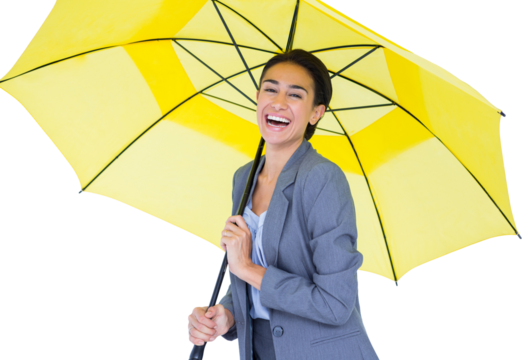 Portrait of happy businesswoman holding umbrella 