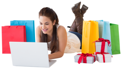 Brunette lying and using her laptop