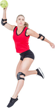 Fototapeta Female athlete with elbow pad throwing handball