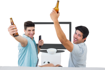 Football fans cheering while holding beer bottles