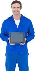 Happy mechanic holding digital tablet