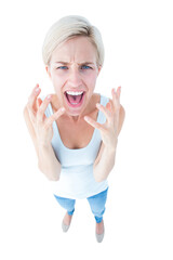 Upset woman yelling with hands up 