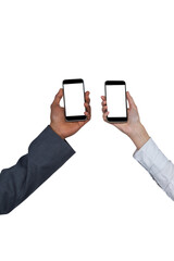 Hands of man and woman holding mobile phones 