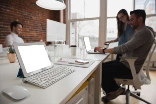 Digital tablet on desk at office