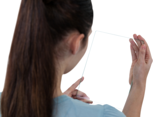 Businesswoman pretending to use glass digital tablet
