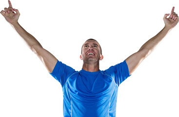 Fototapeta premium Happy rugby player with arms raised