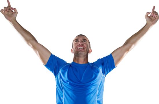 Happy rugby player with arms raised