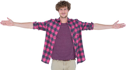 Happy handsome man looking at camera with arms stretched 