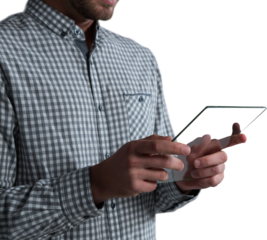 Mid-section of man using glass digital tablet