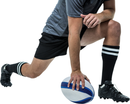 Rugby player in black jersey stretching with ball