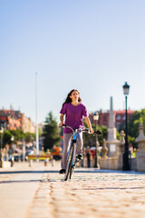 Ecological sustainable environment bicycle lifestyle. active people. Uruguayan latina female