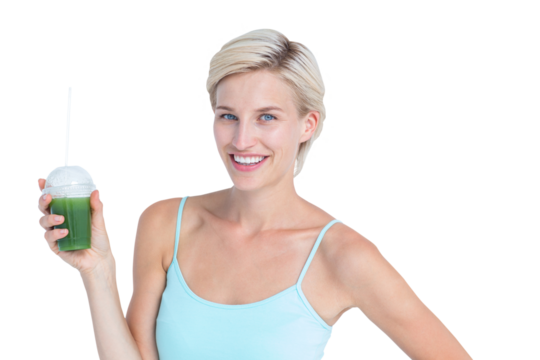 Beautiful woman holding green juice  - Powered by Adobe