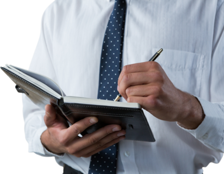 Executive writing on diary