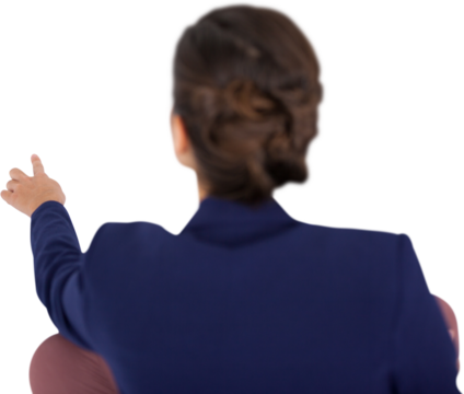 Rear view of businesswoman working on white background