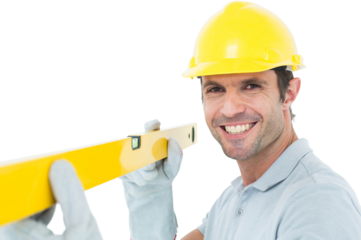 Confident male carpenter holding spirit level