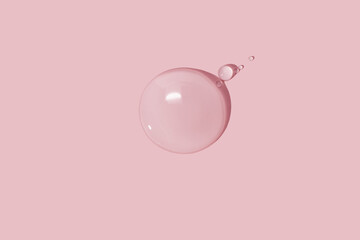 large drops of cosmetic serum, liquid, water, gel on a pink background