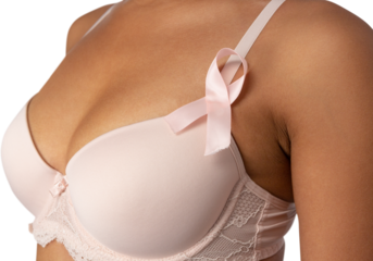 Woman standing for breast cancer awareness against white background