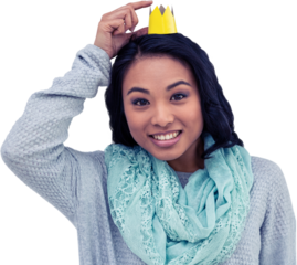 Asian woman pointing her paper crown