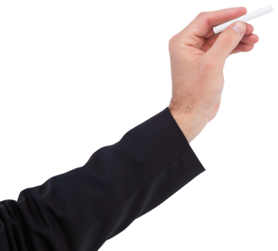 Hand holding a chalk and writing something