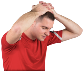 Disappointed football player looking down